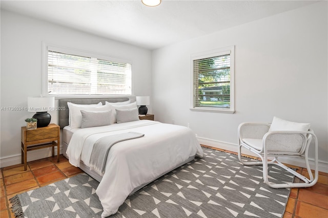 bedroom with multiple windows