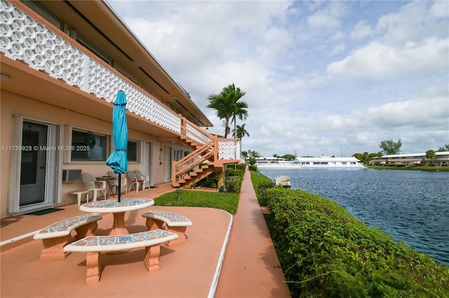 view of patio / terrace with a water view