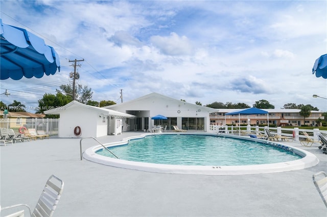 view of swimming pool featuring a patio