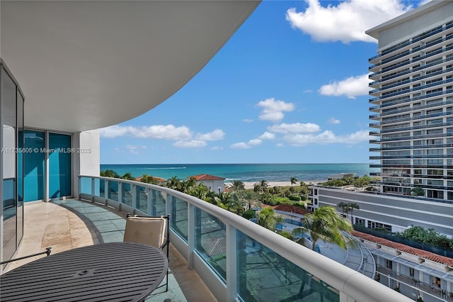 balcony featuring a water view