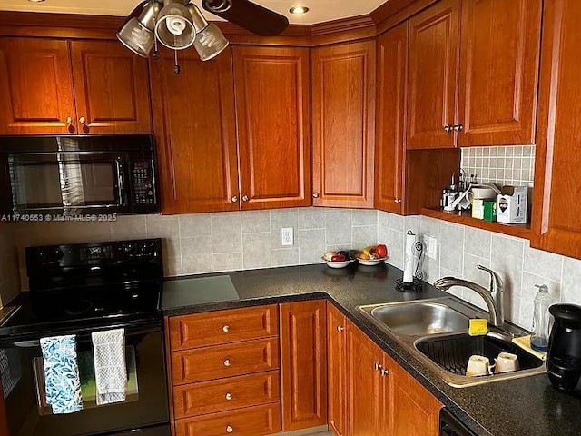 kitchen with sink, backsplash, black appliances, and ceiling fan