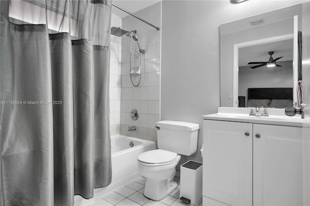 full bathroom featuring tile patterned floors, toilet, vanity, shower / bath combo, and ceiling fan