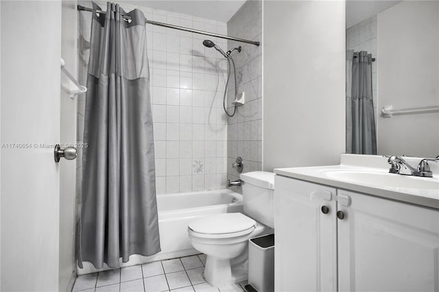 full bathroom featuring vanity, toilet, tile patterned flooring, and shower / bath combo