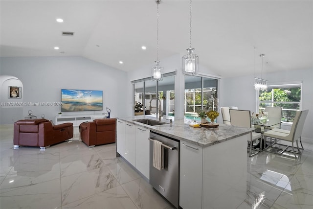 kitchen featuring sink, dishwasher, white cabinetry, a kitchen island with sink, and decorative light fixtures