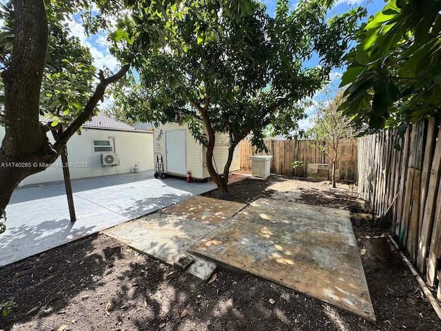 view of patio / terrace with a storage unit