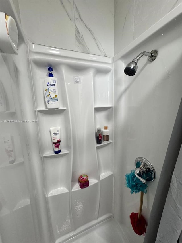 bathroom with walk in shower