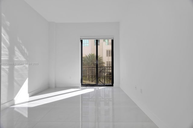 view of tiled spare room