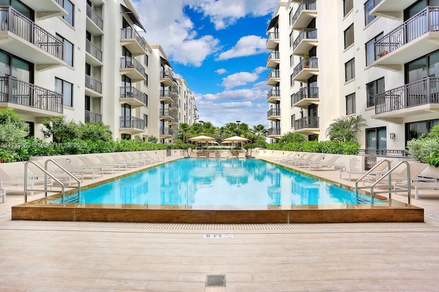 view of swimming pool with a patio