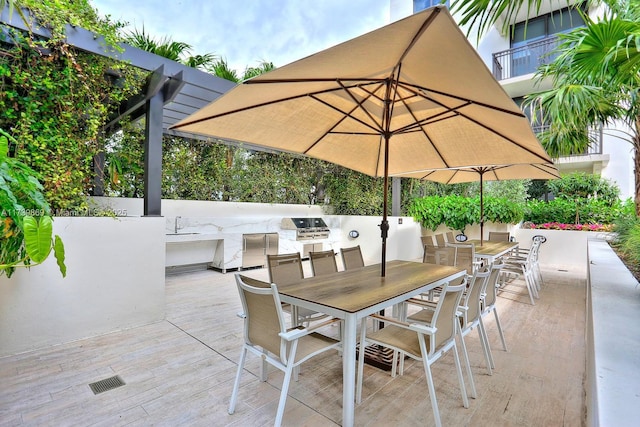 view of patio featuring area for grilling and grilling area