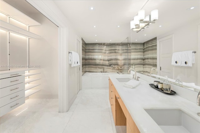 bathroom with vanity and a bathtub