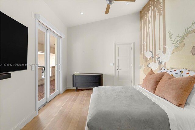 bedroom featuring ceiling fan, light hardwood / wood-style floors, and access to outside