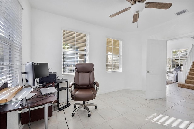 tiled office with ceiling fan