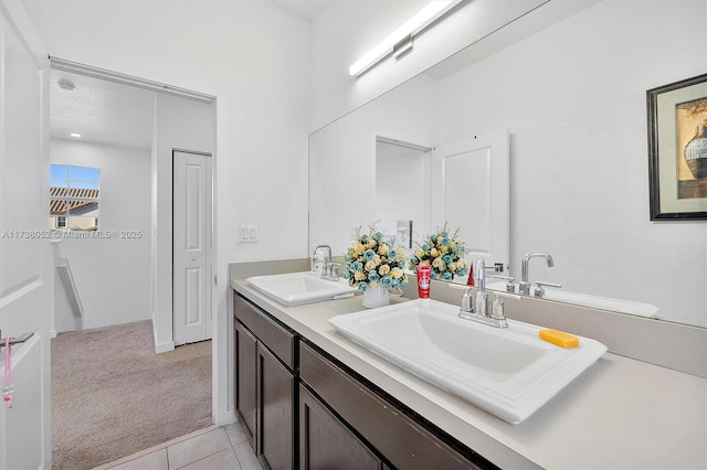 bathroom featuring tile patterned floors and vanity