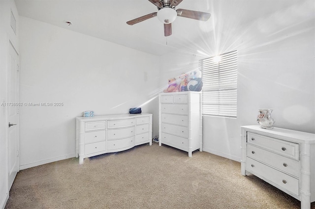 bedroom with lofted ceiling, light colored carpet, and ceiling fan