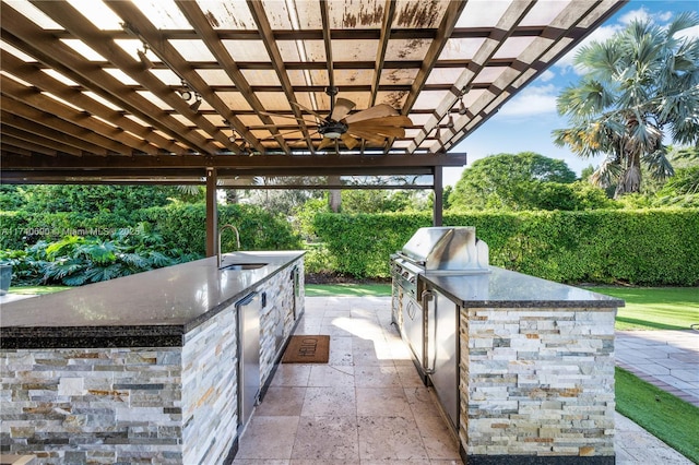 view of patio with sink, ceiling fan, a pergola, a grill, and area for grilling