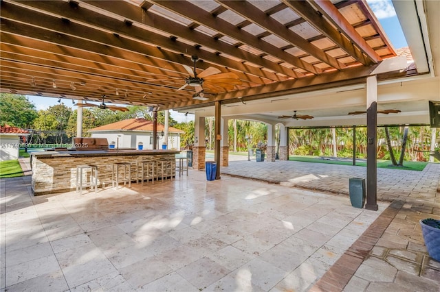 view of patio / terrace with ceiling fan