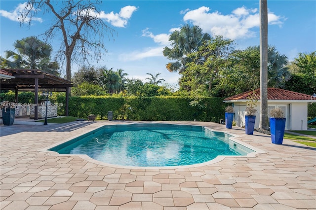 view of swimming pool featuring a gazebo and a patio