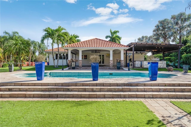 back of house with a gazebo, a lawn, ceiling fan, and a patio area