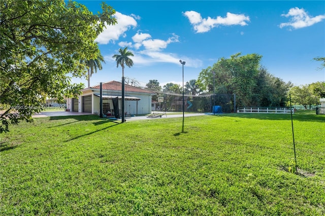 view of yard featuring a garage