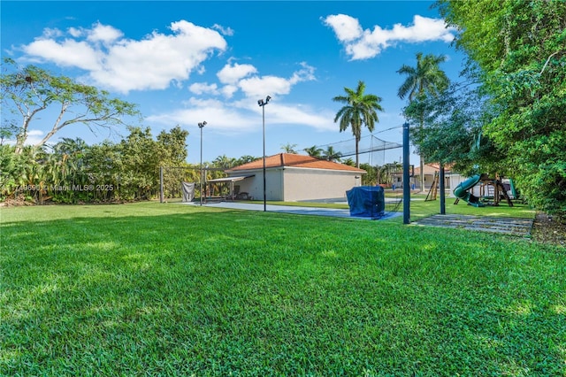 view of yard with a playground