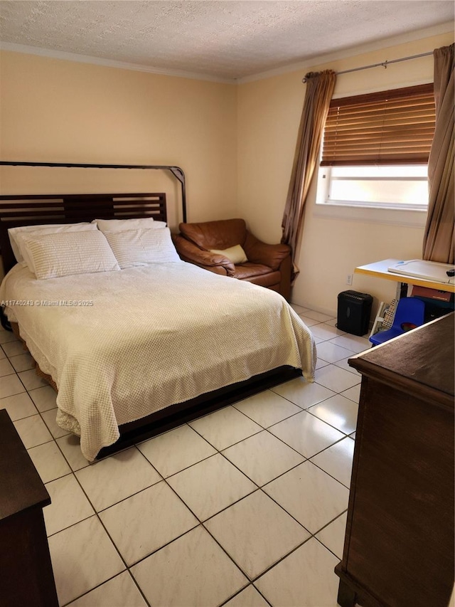 tiled bedroom with crown molding and a textured ceiling