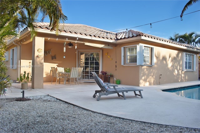 9064 SW 113th Ave, Miami, FL 33176 - rear view of property with ceiling fan, a patio, stucco siding, and a tiled roof
