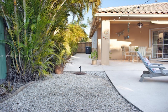 9064 SW 113th Ave, Miami, FL 33176 - view of patio featuring ceiling fan, fence, and a gate