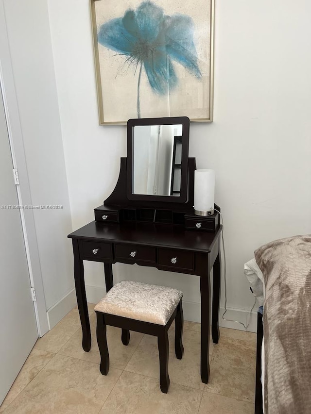 miscellaneous room featuring light tile patterned floors