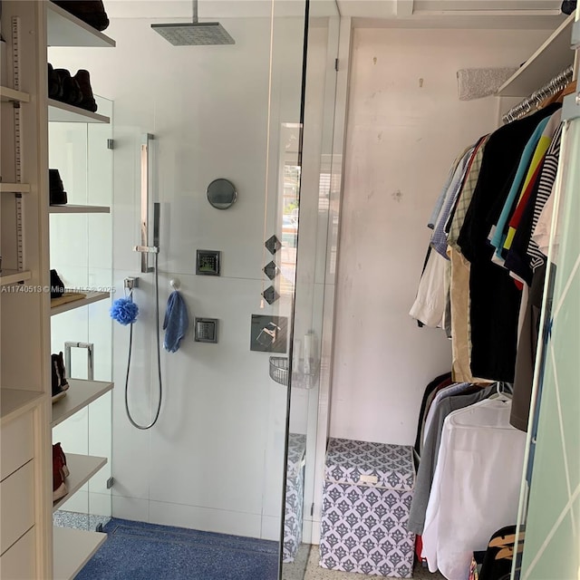 full bath featuring a shower stall