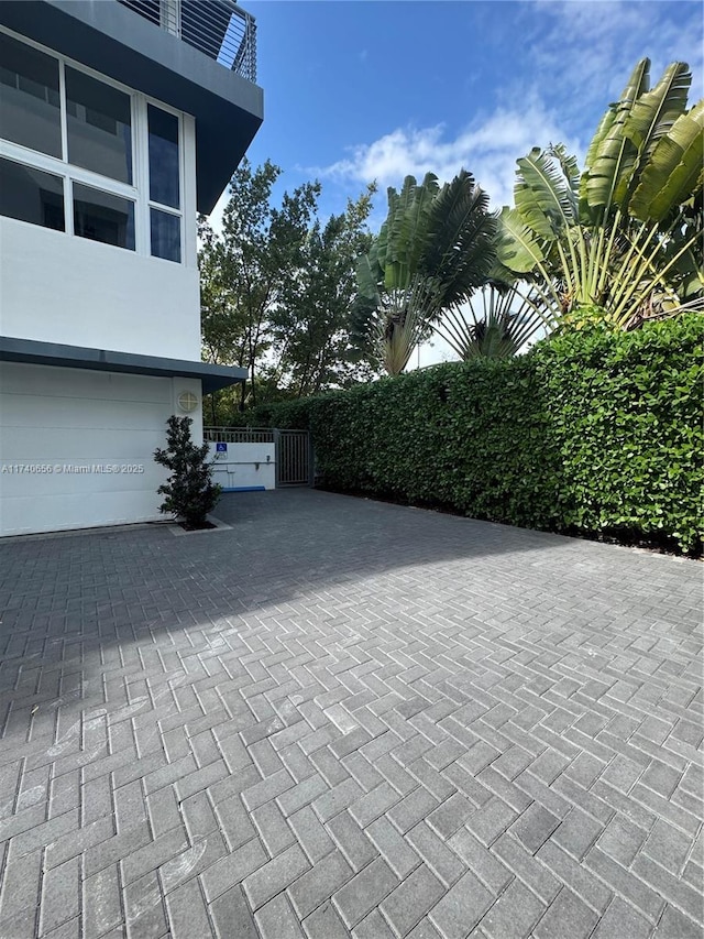 view of patio / terrace featuring a garage