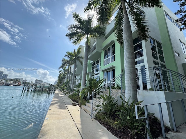 exterior space with a water view