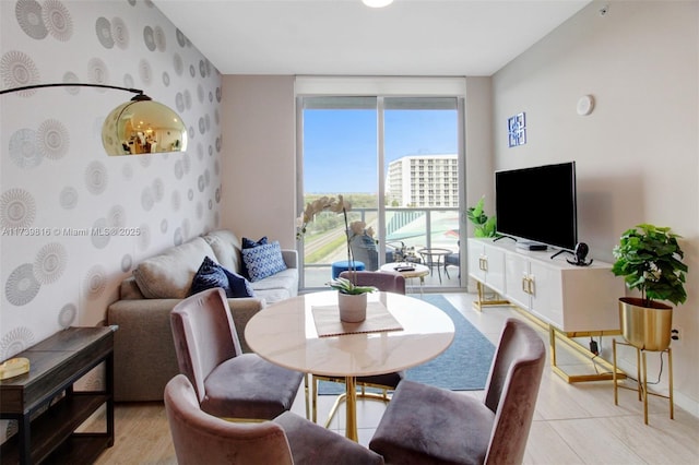 living room with a wall of windows