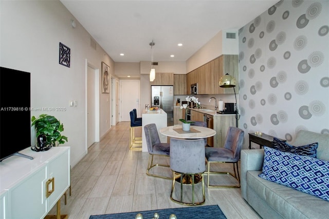 dining room featuring light wood-type flooring