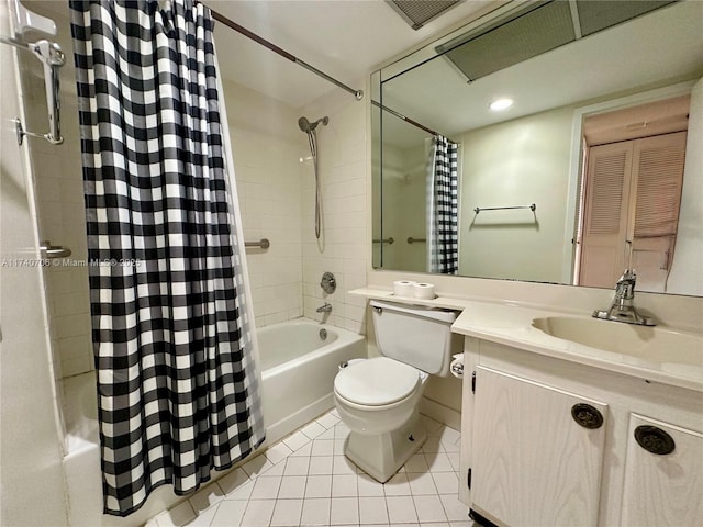 full bathroom featuring shower / bathtub combination with curtain, vanity, tile patterned floors, and toilet