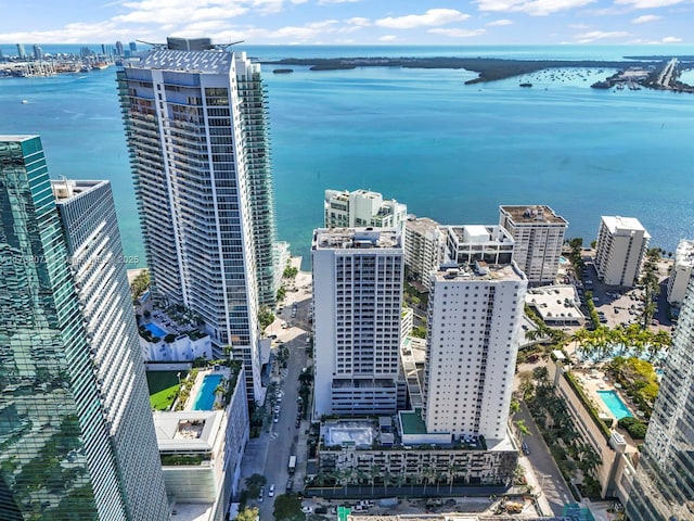 birds eye view of property featuring a water view