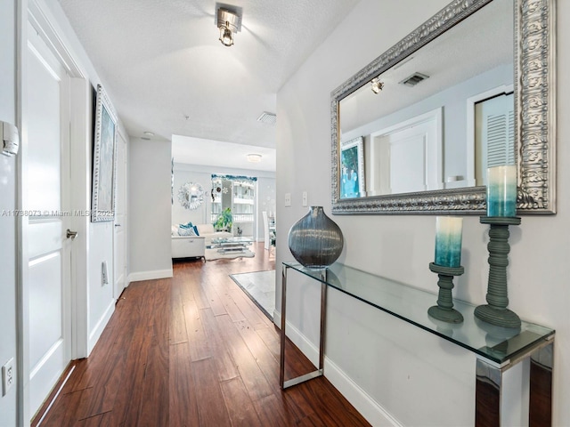 hallway featuring hardwood / wood-style flooring