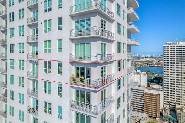 view of building exterior with a water view