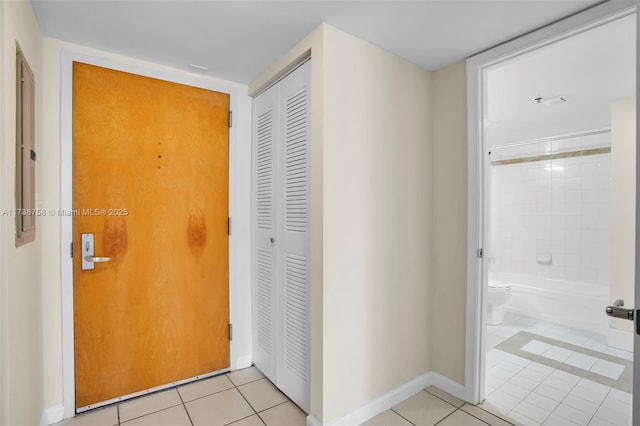 interior space featuring light tile patterned flooring