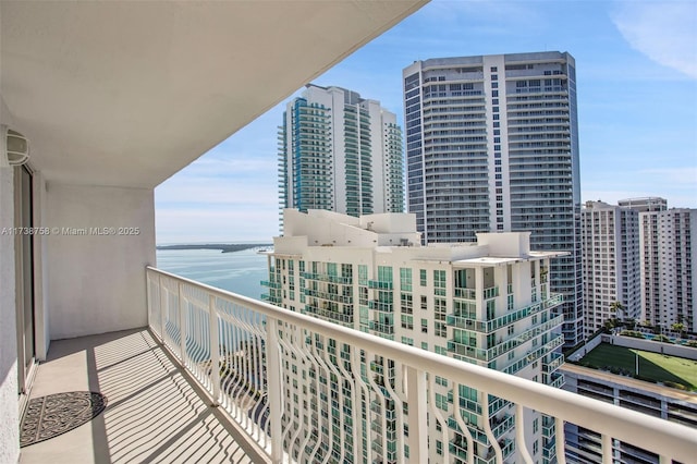 balcony featuring a water view