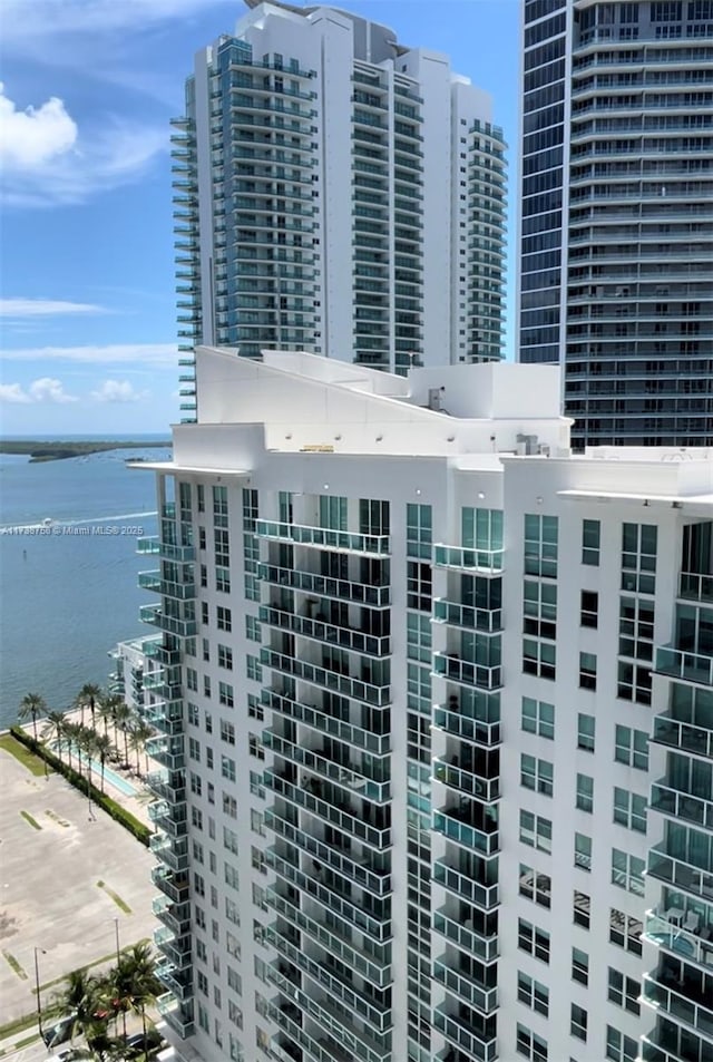 view of property with a water view