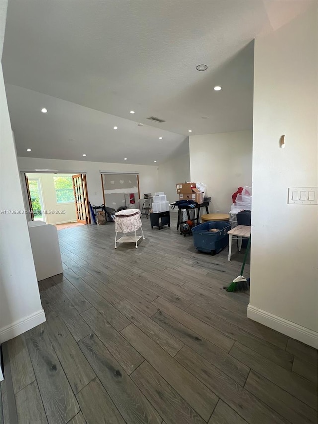 living room featuring dark wood-type flooring