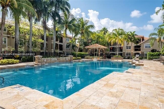 view of swimming pool featuring a patio area