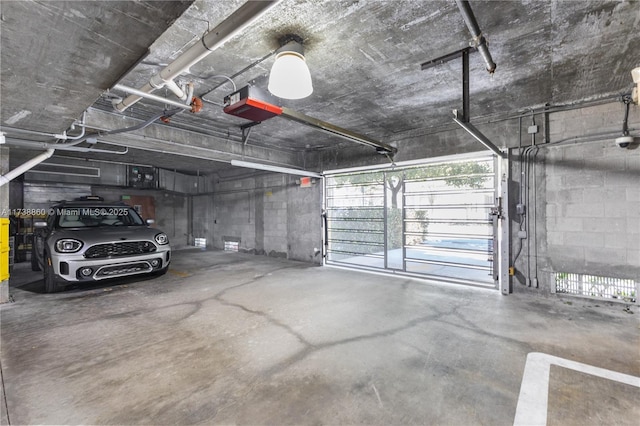 garage featuring a garage door opener