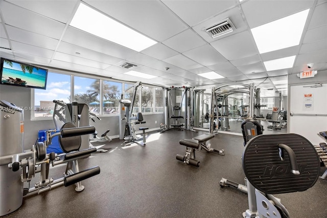 gym featuring a drop ceiling