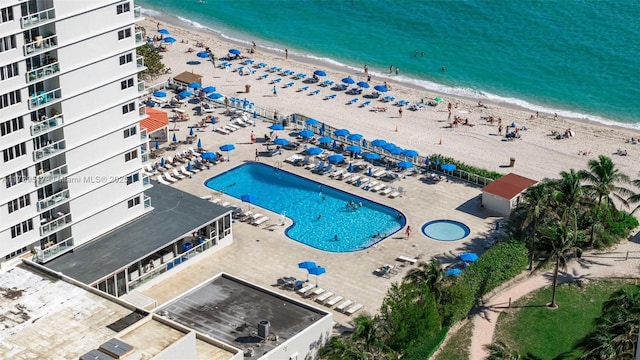 aerial view with a view of the beach and a water view