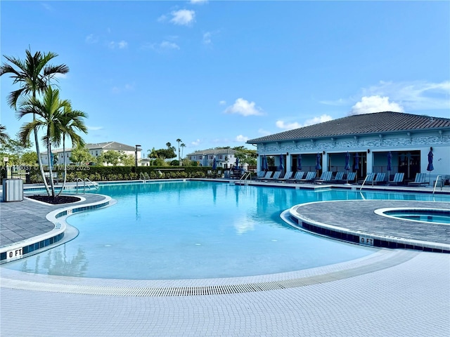 view of pool featuring a community hot tub