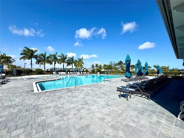 view of swimming pool with a patio area