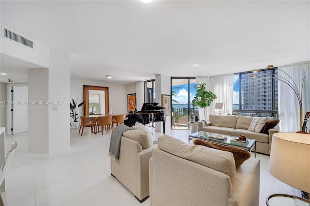 living room with floor to ceiling windows