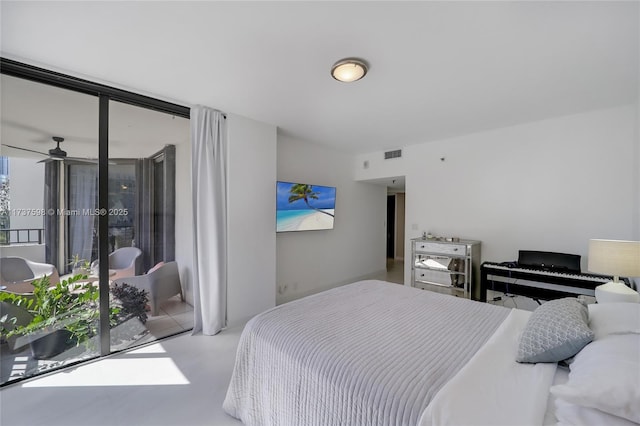 bedroom featuring a wall of windows