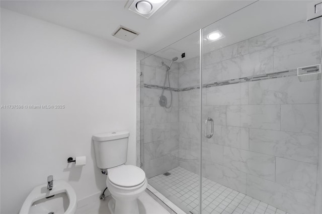 bathroom featuring a bidet, a shower with door, and toilet